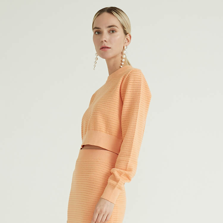 浅橙色偷洞设计简约时尚两件套女装短裤